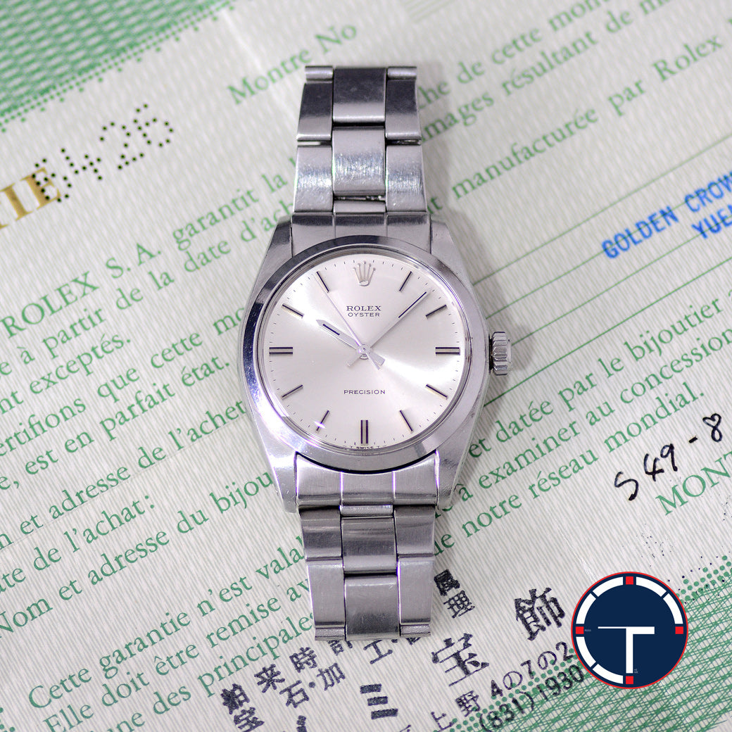 นาฬิกา Rolex Ref.6426 หน้าปัดสีเงิน สายOysterแท้ ตัวเรือนไม่เคยขัด มีใบ ปี1973 ไขลาน ขนาด 34 mm