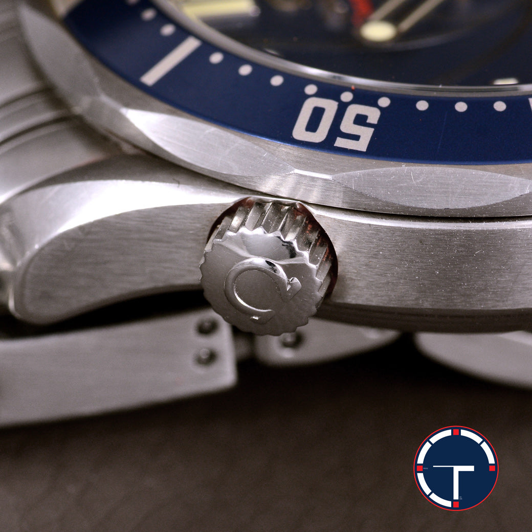 นาฬิกา Omega "Unpolished" Seamaster Casino Royale James Bond Limited Edition Co-Axial หน้าปัดสีกรมท่า เกลียวกระสุน ขอบฟิล์มเดิม ตัวเรือนไม่เคยขัด สายเหล็กแท้ กล่อง ใบครบ นาฬิกาปี2006 Automatic ขนาด 41 mm