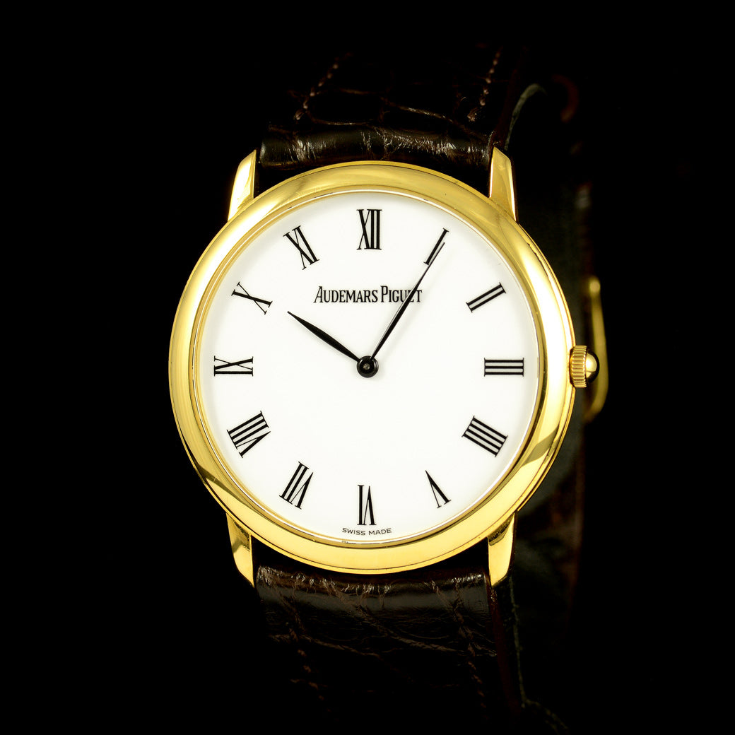 นาฬิกา Audemars Piguet(AP) Jules Audemars Yellow Gold 18K หน้าปัดสีขาว หลักชั่วโมงเลขโรมัน ตัวเรือนทองคำ18K สายหนังแท้ หัวเข็มขัดแท้ ไขลาน(Manual Winding) ขนาด 34 mm