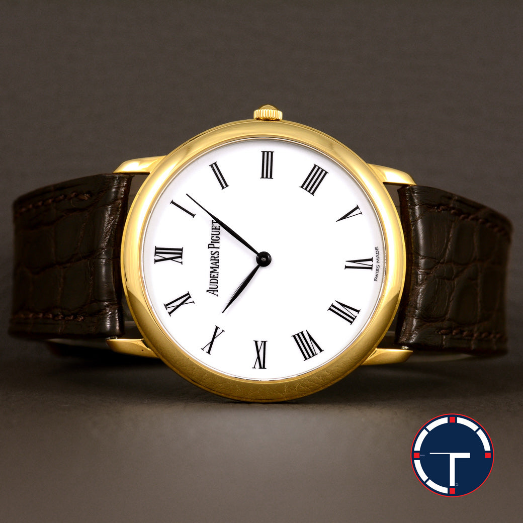 นาฬิกา Audemars Piguet(AP) Jules Audemars Yellow Gold 18K หน้าปัดสีขาว หลักชั่วโมงเลขโรมัน ตัวเรือนทองคำ18K สายหนังแท้ หัวเข็มขัดแท้ ไขลาน(Manual Winding) ขนาด 34 mm