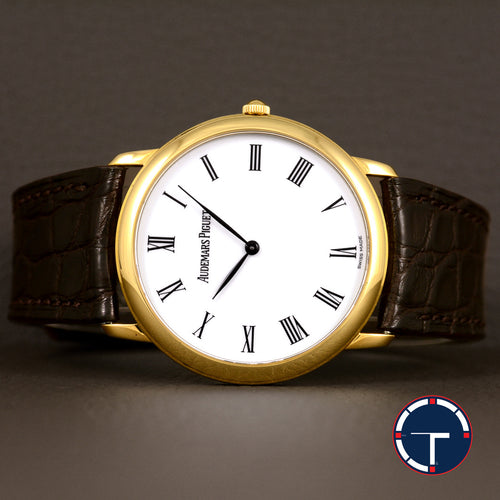 **HOLD** นาฬิกา Audemars Piguet(AP) Jules Audemars Yellow Gold 18K หน้าปัดสีขาว หลักชั่วโมงเลขโรมัน ตัวเรือนทองคำ18K สายหนังแท้ หัวเข็มขัดแท้ ไขลาน(Manual Winding) ขนาด 34 mm