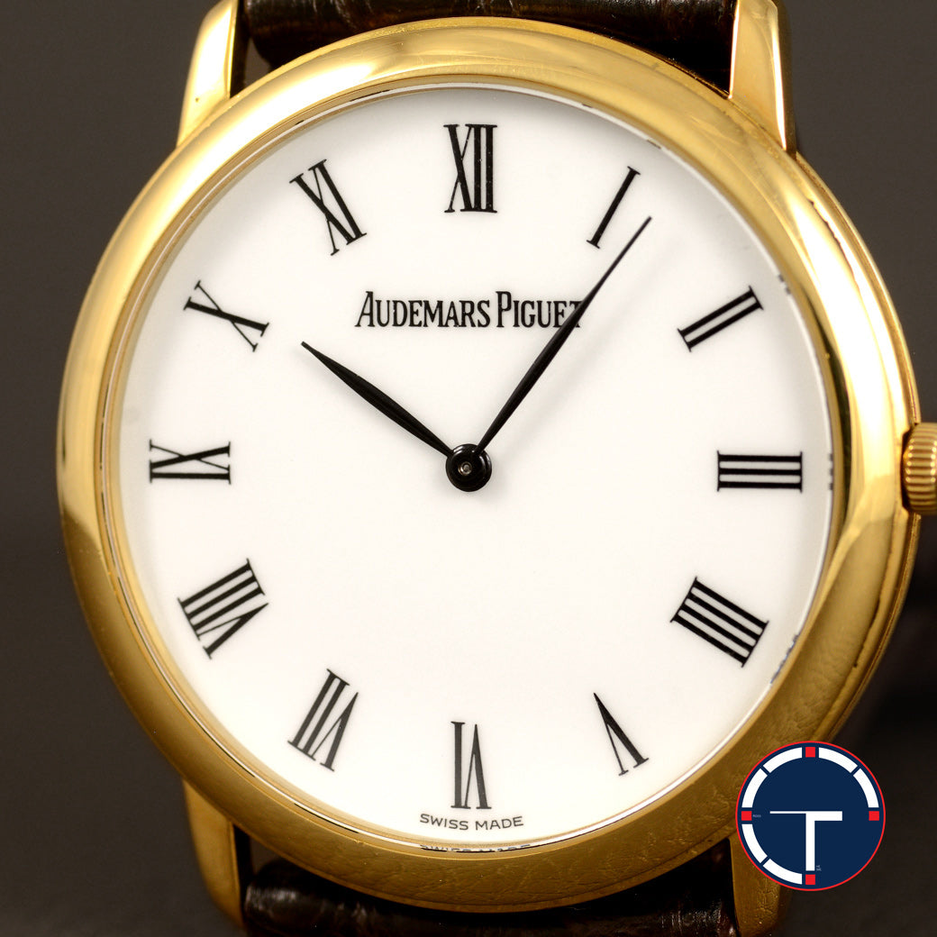 นาฬิกา Audemars Piguet(AP) Jules Audemars Yellow Gold 18K หน้าปัดสีขาว หลักชั่วโมงเลขโรมัน ตัวเรือนทองคำ18K สายหนังแท้ หัวเข็มขัดแท้ ไขลาน(Manual Winding) ขนาด 34 mm