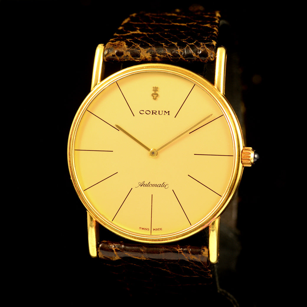 นาฬิกา Corum "Unpolished" Karesansui Garden Ref.58102 18K Yellow Gold หน้าปัดสีทอง ตัวเรือนทองคำ18K(แบบาง)"ไม่เคยขัด" สายหนังแท้ หัวเข็มขัดแท้ Automatic ขนาด 35 mm