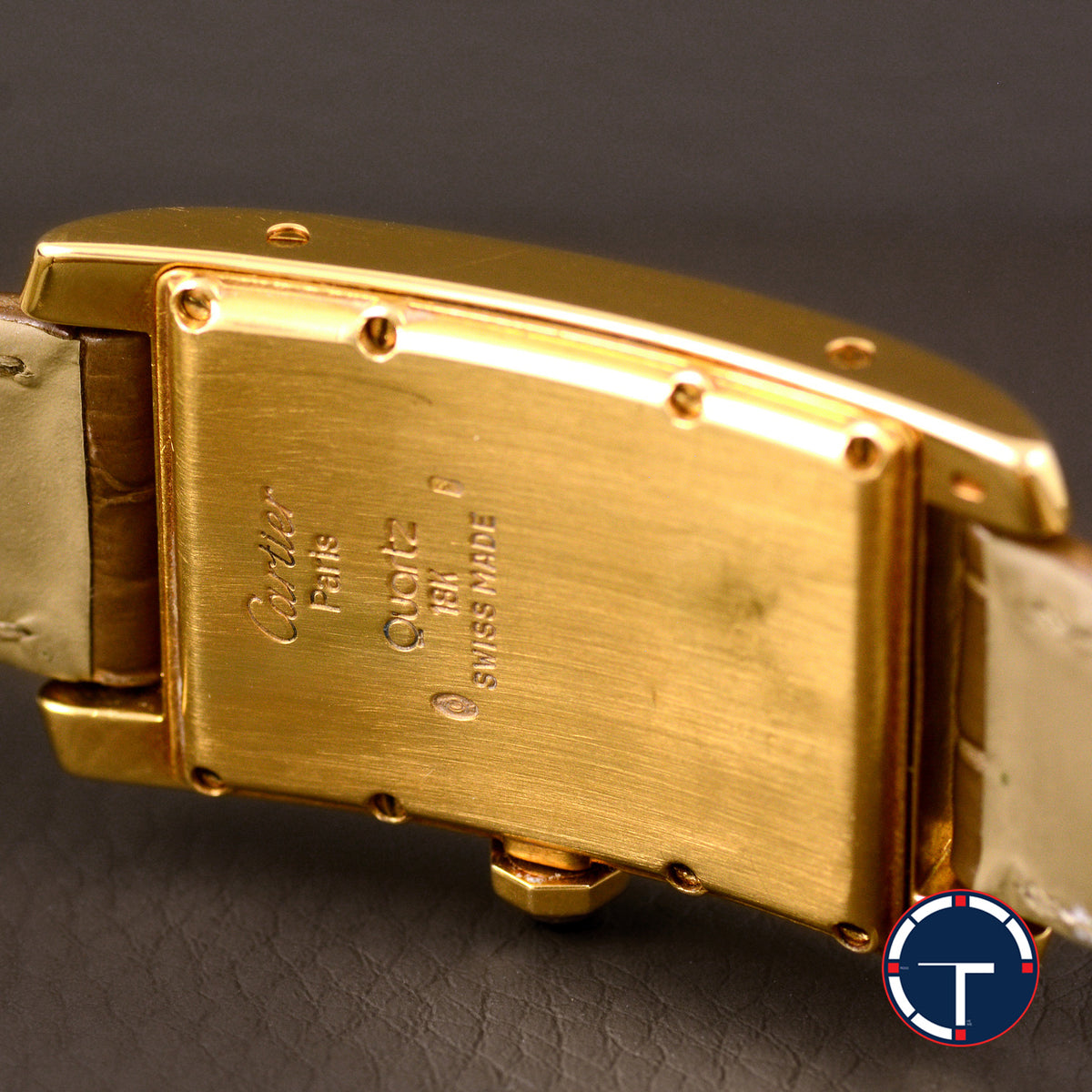 นาฬิกา Cartier Tank Américaine 18K Yellow Gold หน้าปัดสีครีม ตัวเรือนทองคำ18K สายหนังแท้ หัวเข็มขัดแท้ทองคำ18K Quartz ขนาด 22.5x41.5(Size M)