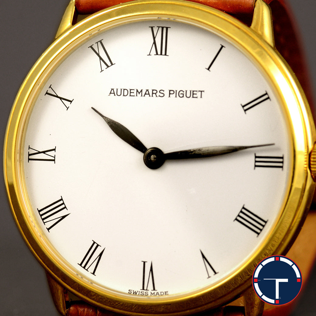 นาฬิกา Audemars Piguet (AP) Vintage 18K Yellow Gold Original Buckle หน้าปัดสีขาว หลักชั่วโมงเลขโรมัน ตัวเรือนทองคำ18K หัวเข็มขัดแท้ Quartz ขนาด 31 mm