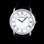 นาฬิกา Audemars Piguet(AP) Jules Audemars White Gold 18K หน้าปัดสีขาว หลักชั่วโมงเลขโรมัน ตัวเรือนทองคำขาว18K สายหนังแท้ หัวเข็มขัดแท้ ไขลาน(Manual Winding) ขนาด 34 mm