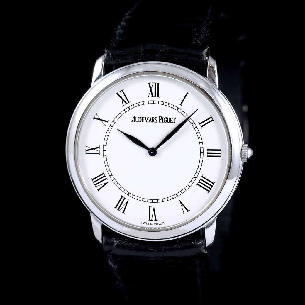 นาฬิกา Audemars Piguet(AP) Jules Audemars White Gold 18K หน้าปัดสีขาว หลักชั่วโมงเลขโรมัน ตัวเรือนทองคำขาว18K สายหนังแท้ หัวเข็มขัดแท้ ไขลาน(Manual Winding) ขนาด 34 mm