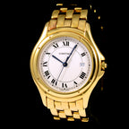 นาฬิกา Cartier "Unpolished" Cougar Ref.887904 18k Yellow Gold หน้าปัดสีขาว หลักชั่วโมงเลขโรมัน ตัวเรือนและสายทองคำ18K Quartz ขนาด 32 mm