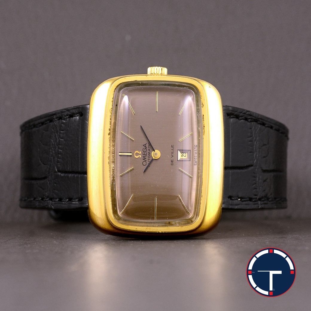 นาฬิกา Omega De Ville หน้าปัดสีทองเข้ม กะไหล่ทอง ทรงสีเหลี่ยมผืนผ้า Automatic ขนาด 31x36 mm