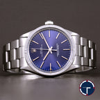 นาฬิกา Rolex Oyster Perpetual Ref.1007 Sigma Dial หน้าปัดฟ้าอมม่วง หลังชั่วโมงทองคำSigma ขอบรางรถไฟ สายOysterแท้ นาฬิกาปี1974 Automatic ขนาด 34 mm