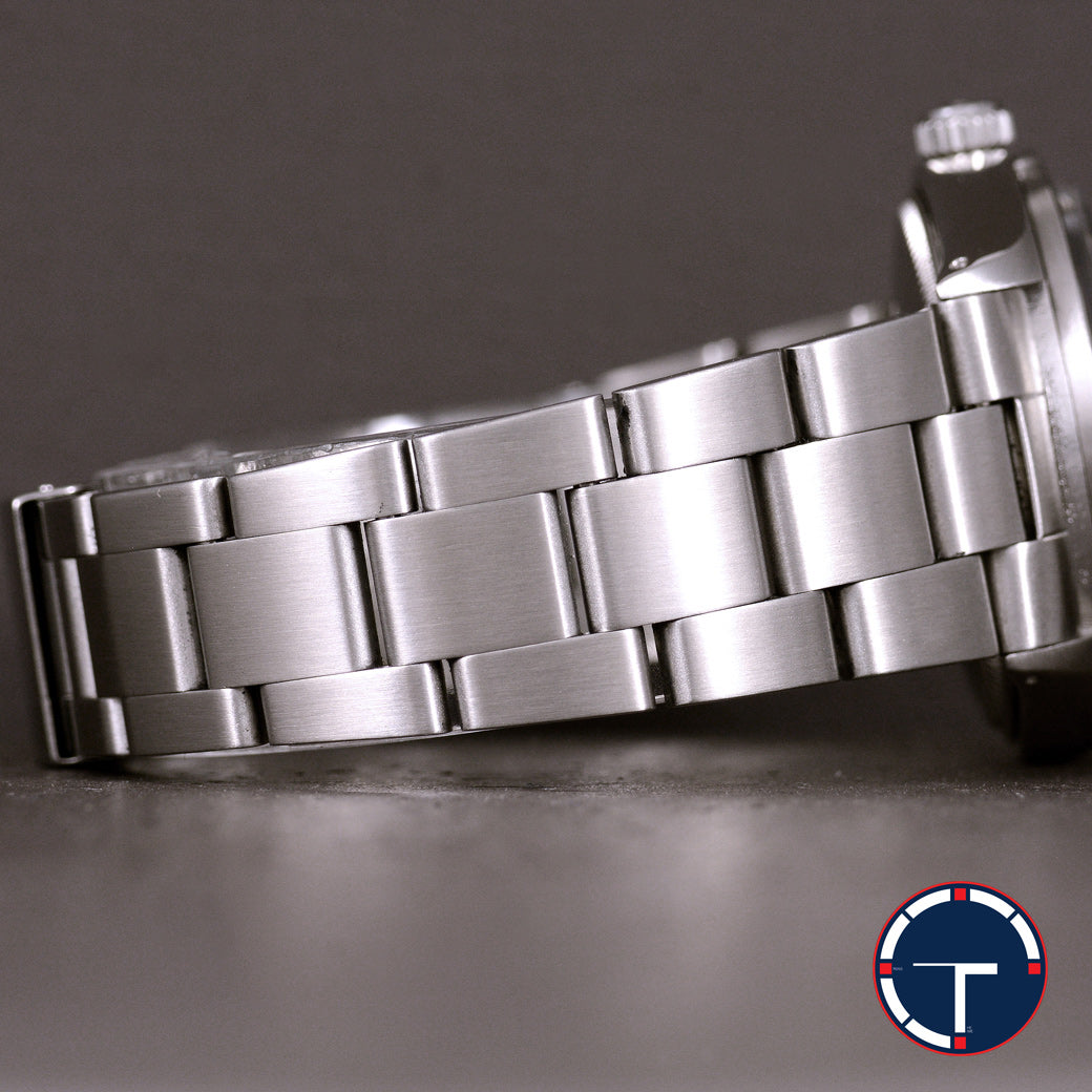 นาฬิกา Rolex Oyster Perpetual Ref.1007 Sigma Dial หน้าปัดฟ้าอมม่วง หลังชั่วโมงทองคำSigma ขอบรางรถไฟ สายOysterแท้ นาฬิกาปี1974 Automatic ขนาด 34 mm