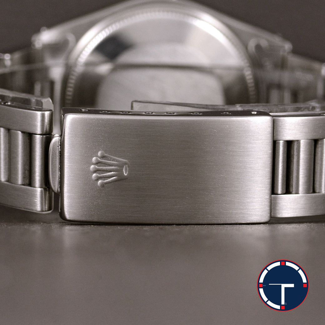 นาฬิกา Rolex Oyster Perpetual Ref.1007 Sigma Dial หน้าปัดฟ้าอมม่วง หลังชั่วโมงทองคำSigma ขอบรางรถไฟ สายOysterแท้ นาฬิกาปี1974 Automatic ขนาด 34 mm